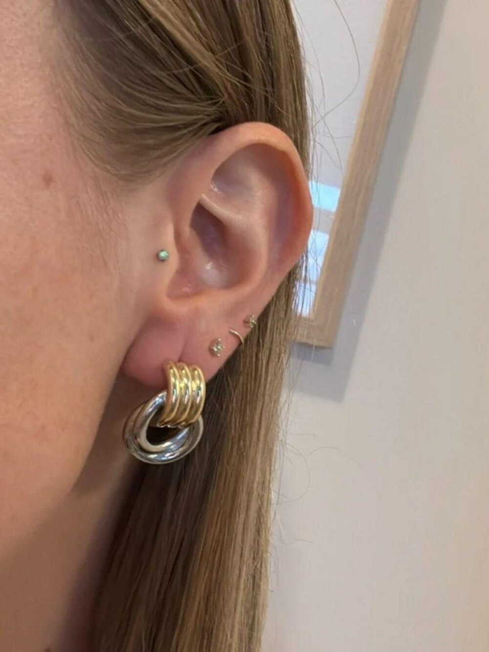 The Julia Chunky bold knot stud earrings duo tone silver and gold